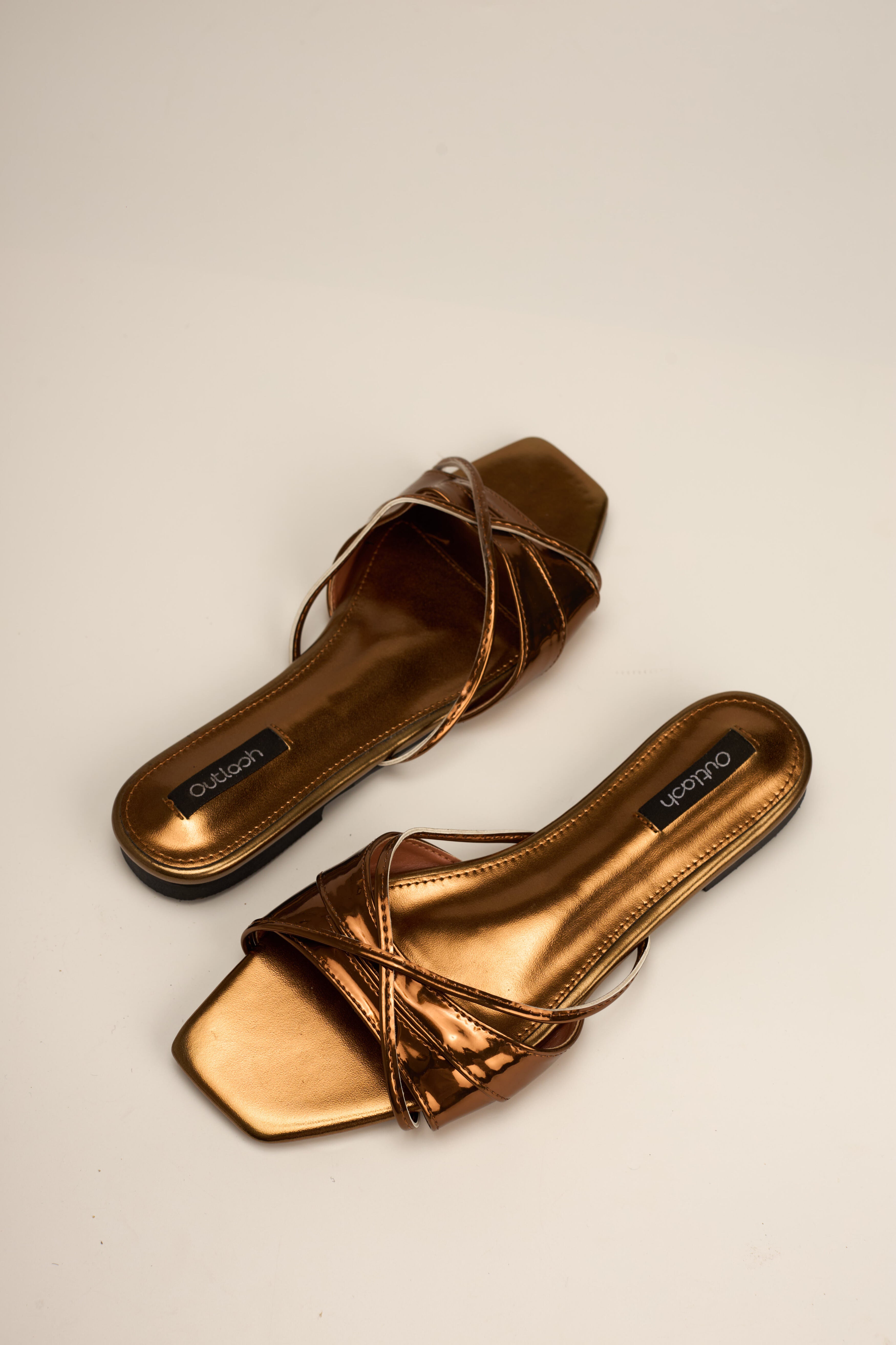 OASIS SLIDES IN BRONZE